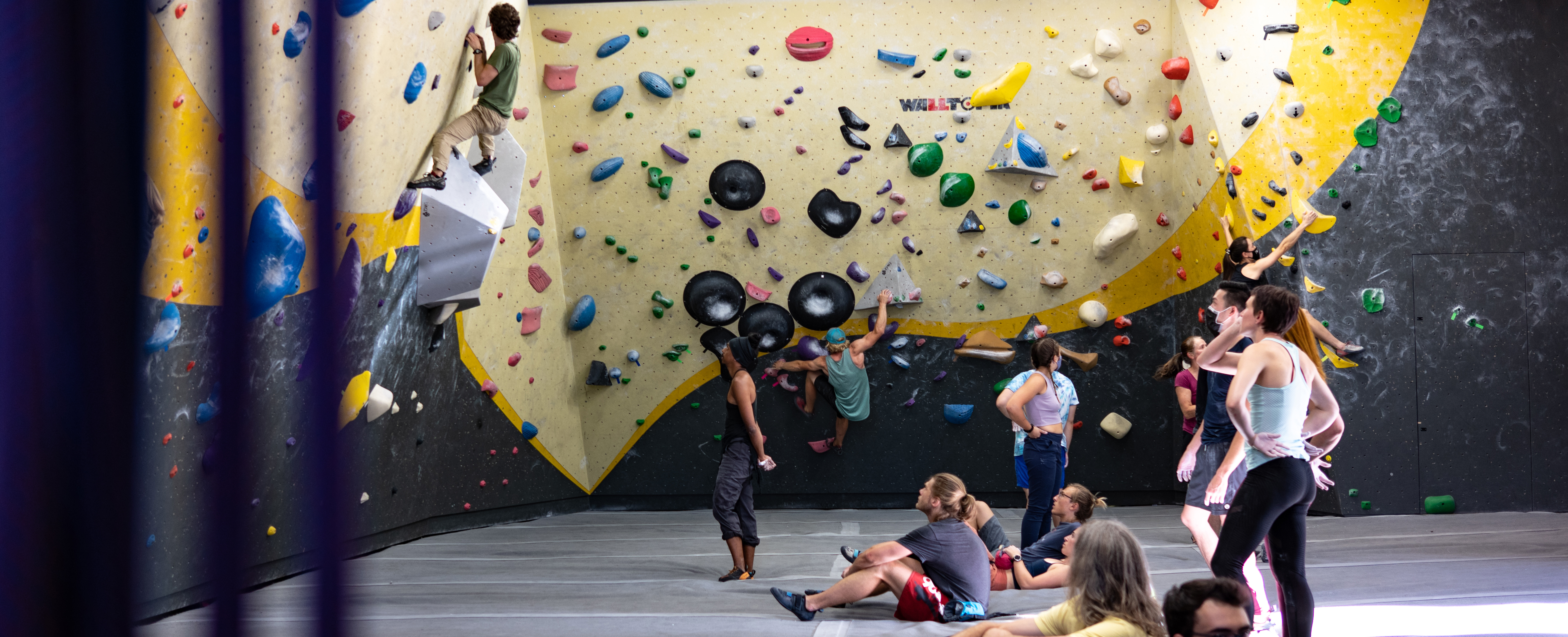 group of climbers gathered in bouldering area